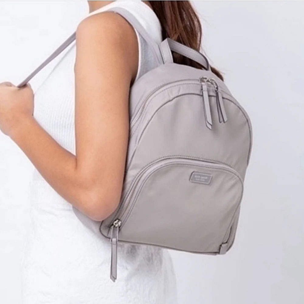 Kate Spade Dawn medium size backpack in light gray